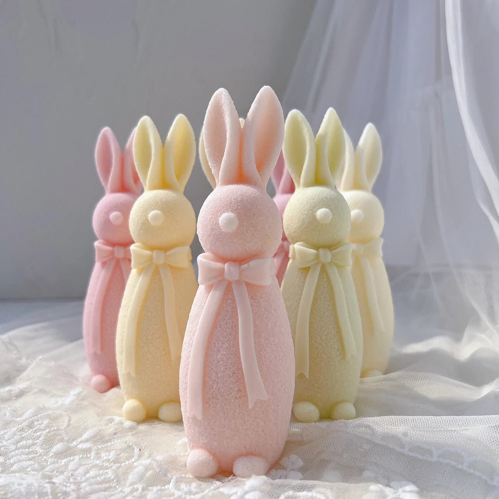 Tall bow-wearing rabbit castings with plush-like texture