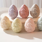 Close-up of horse motif relief on decorative candle eggs