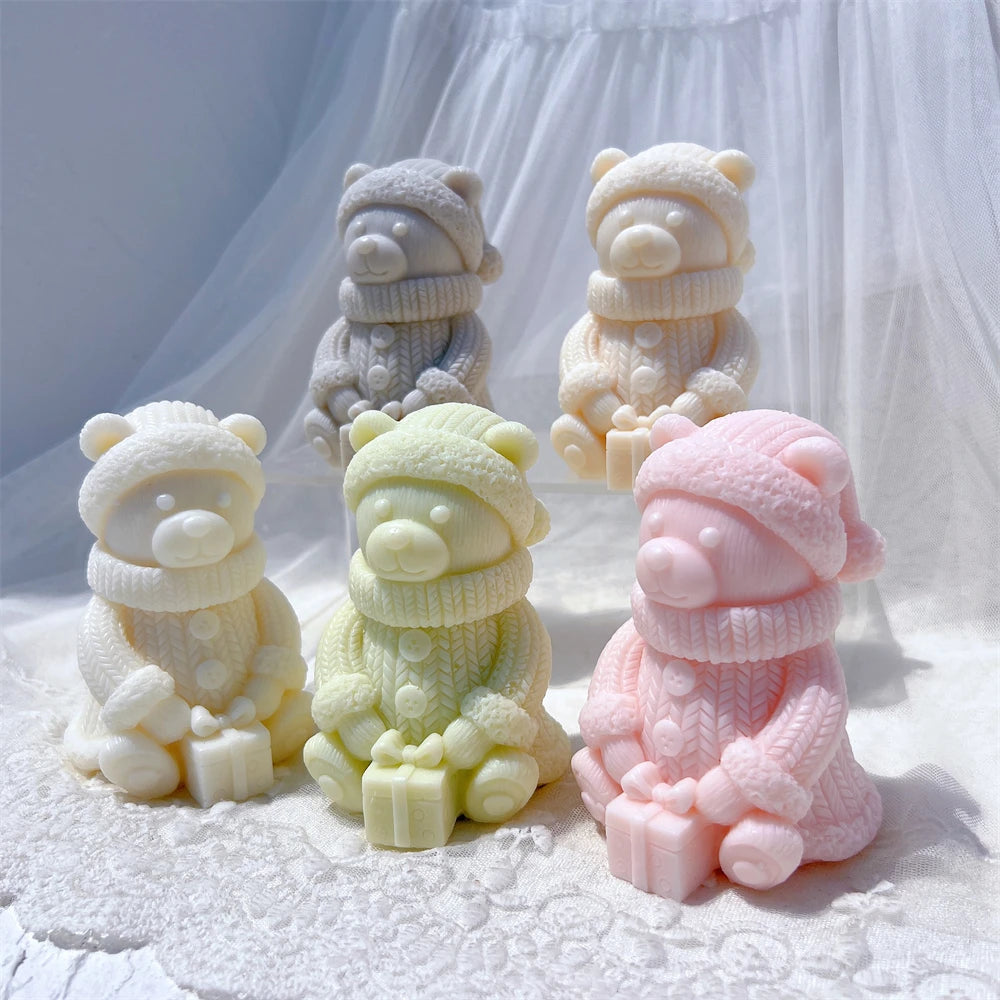 Close group of bears holding connected gift boxes