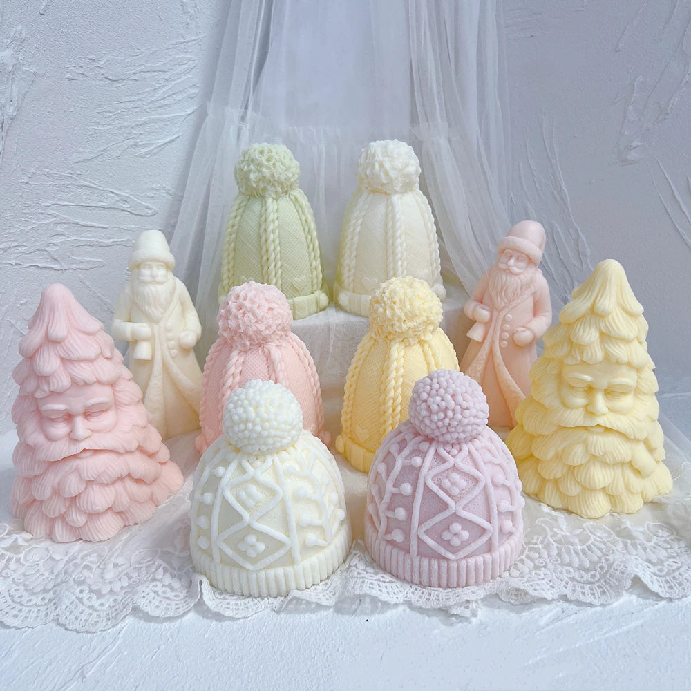Geometric and cable-knit hat samples in a mixed Christmas figurine display