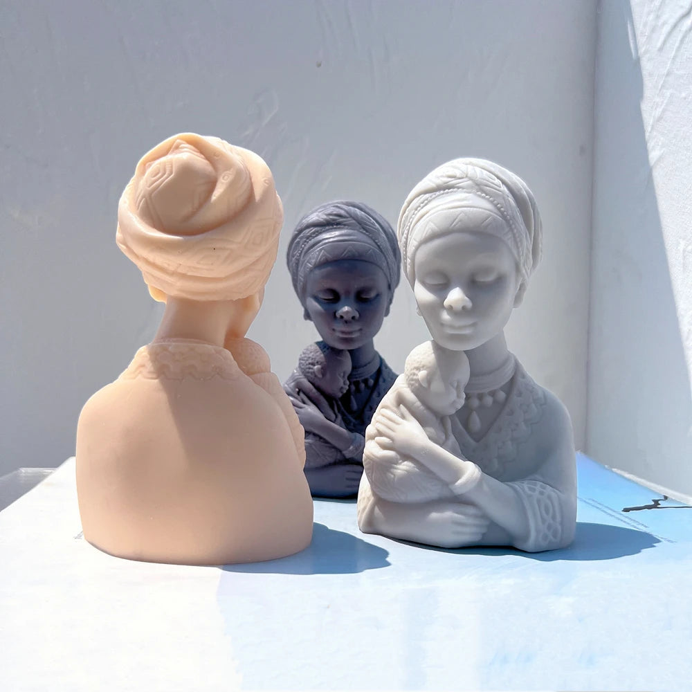 Front and smooth rear views of mother-and-baby busts