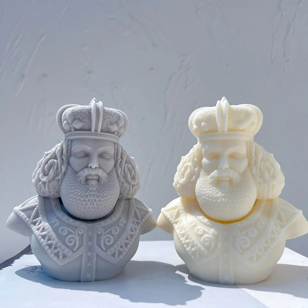 Pair of bearded king bust castings with crowns
