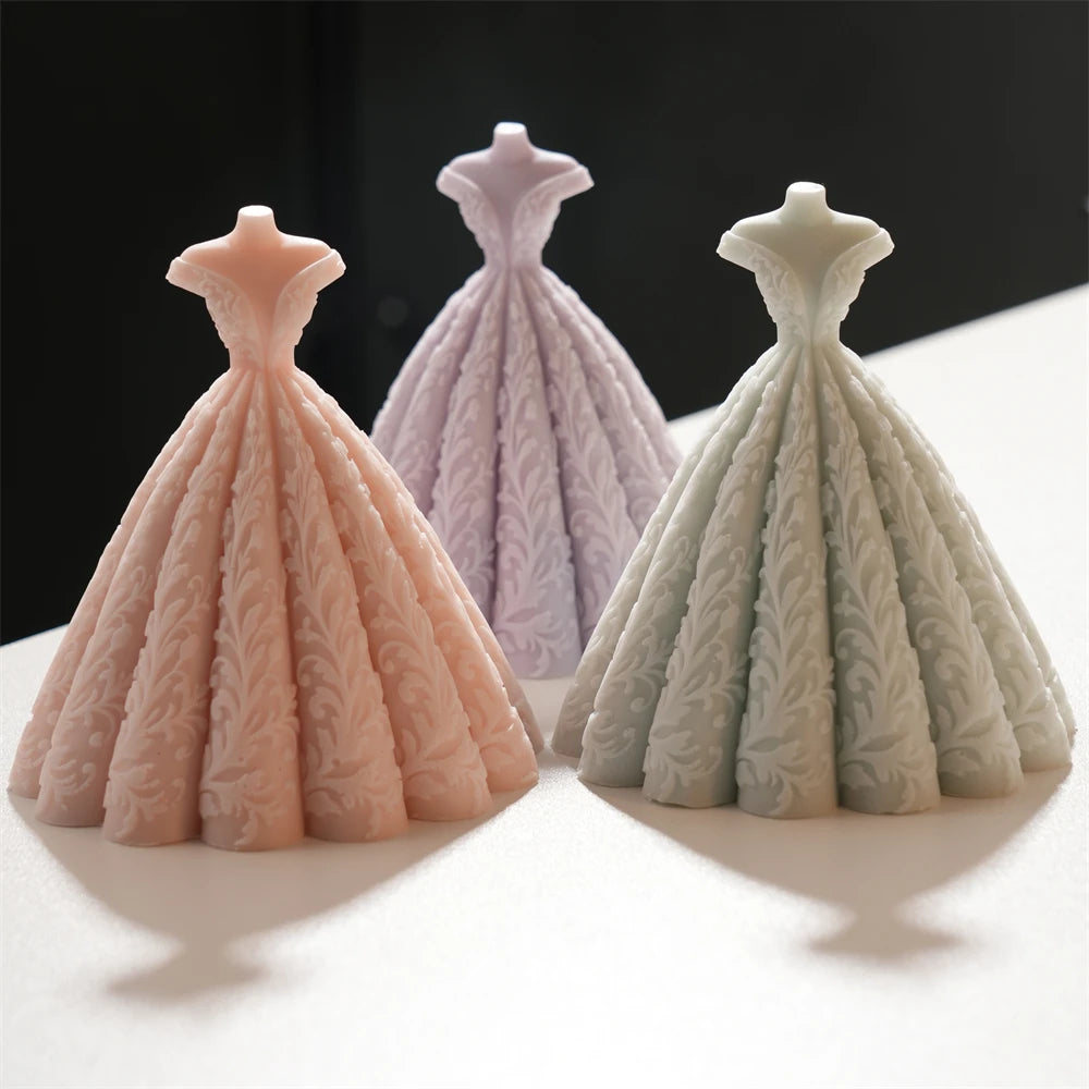 Three full-skirt bridal gown castings with flared fabric folds