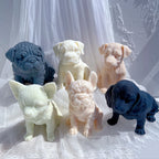 Front and angled views of assorted dog figurine castings with pointed and floppy ears