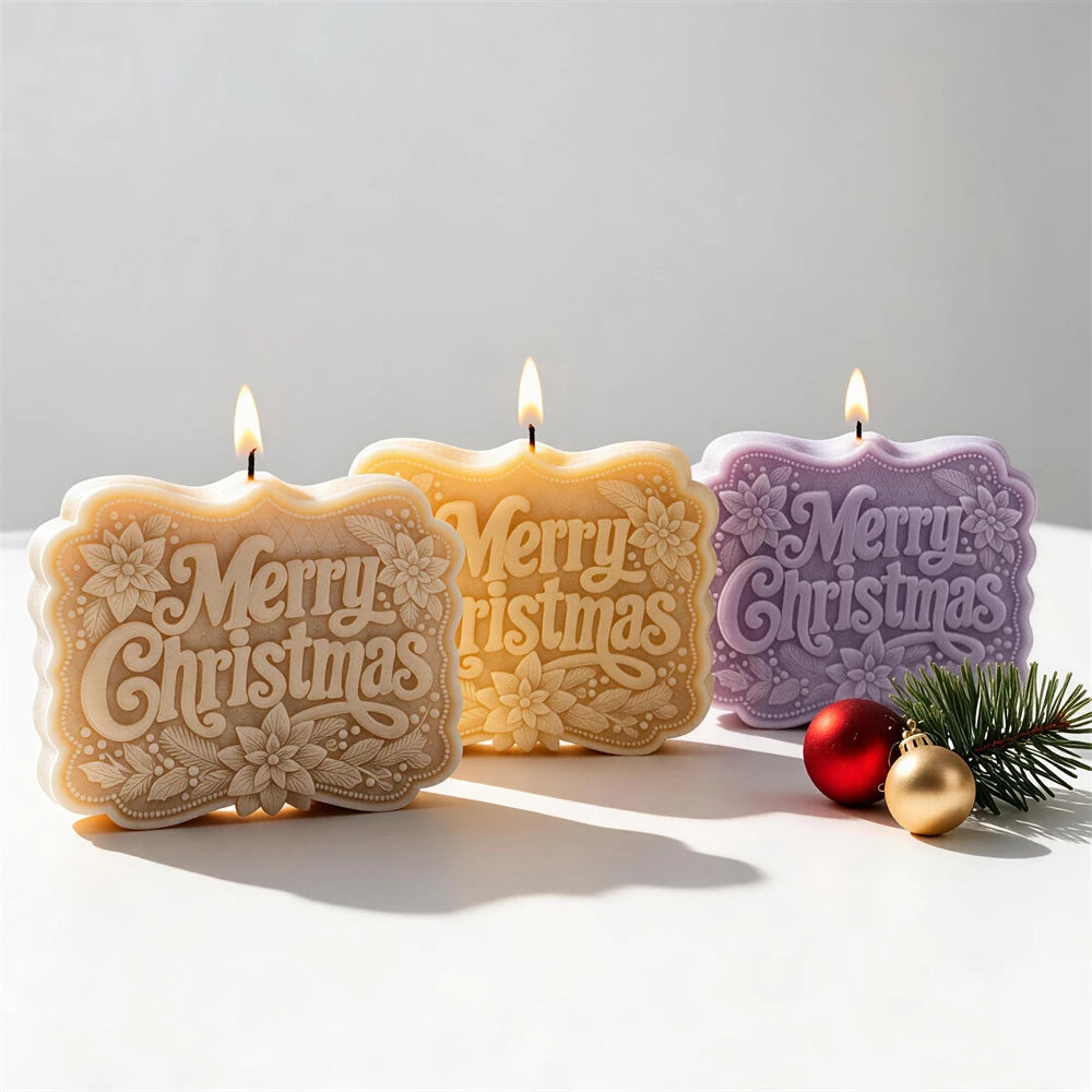 Three sign-shaped candles with Merry Christmas lettering