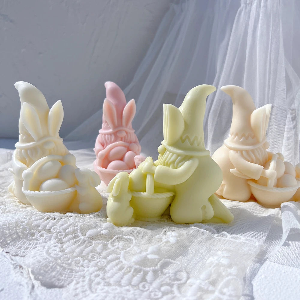 Side view of Easter gnome scene with small rabbit beside the basket