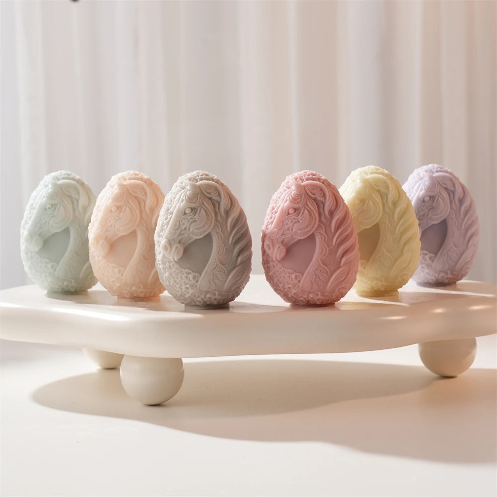 Pastel horse-head relief Easter egg candles arranged in a row
