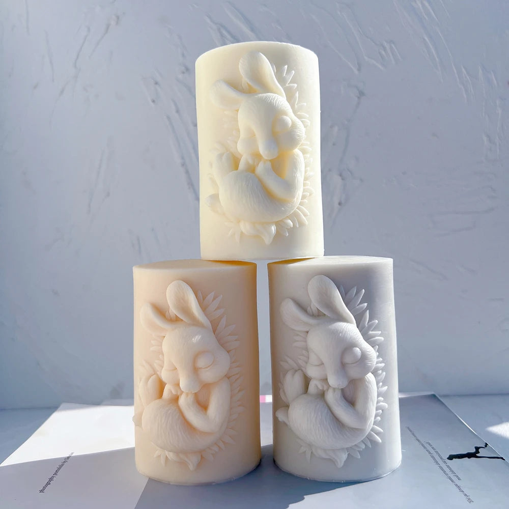 Three rabbit cameo castings arranged at different display heights