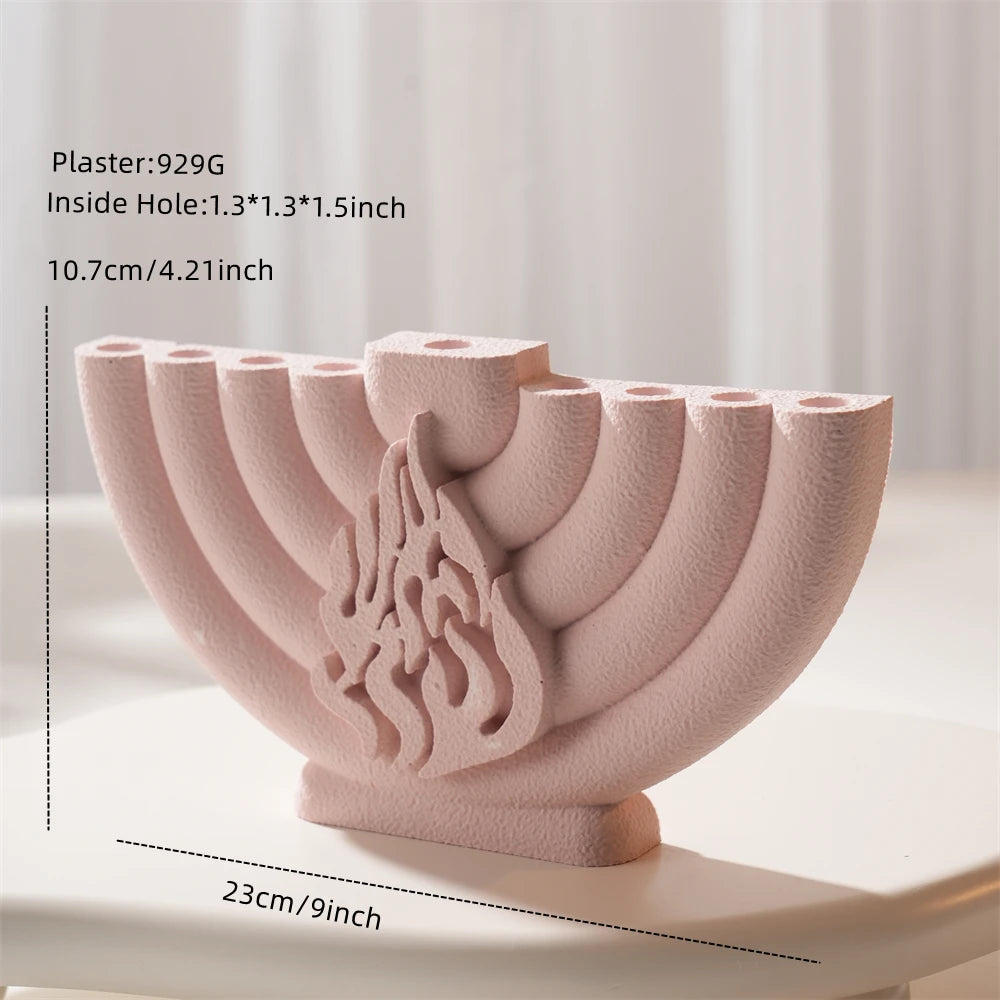 Pink casting of a nine-branched menorah with dimension callouts and candle sockets