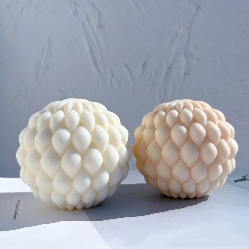 Rounded scale candles showing their tapered overlapping tips