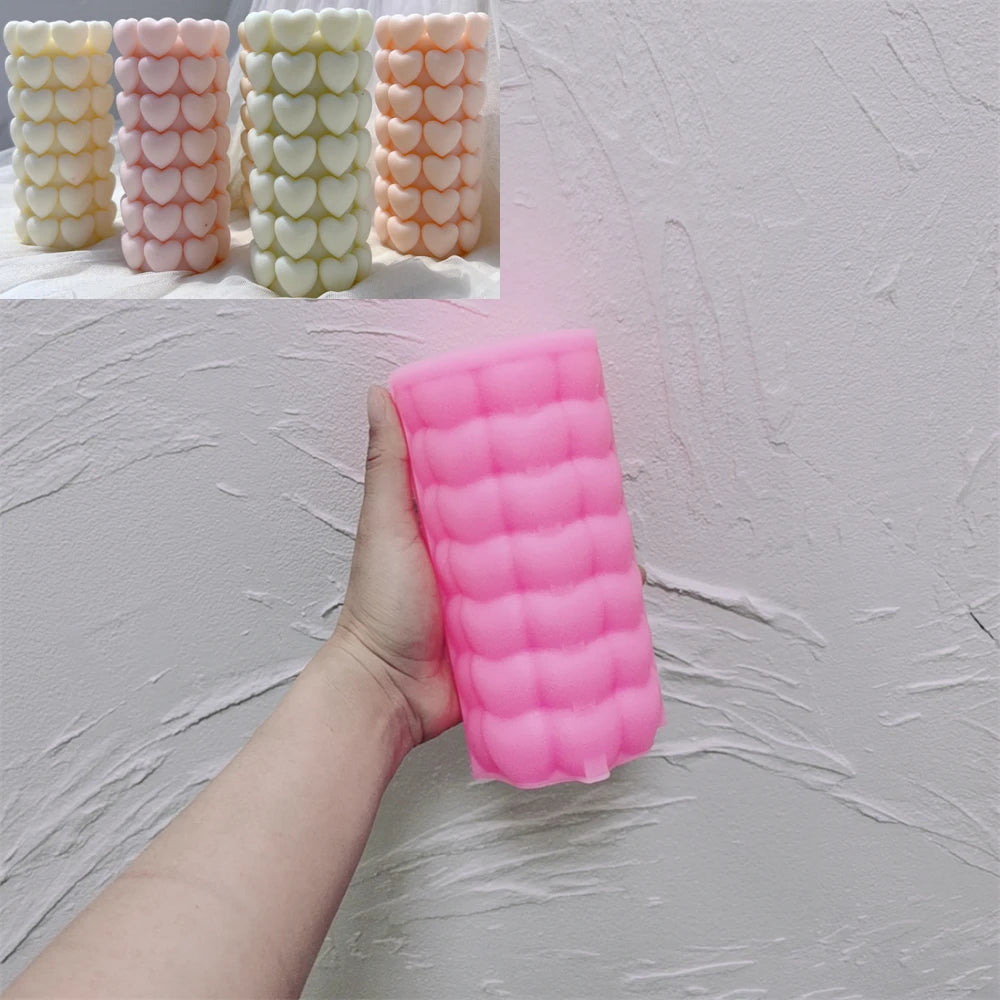 Pink silicone mold for stacked heart-texture pillar candle