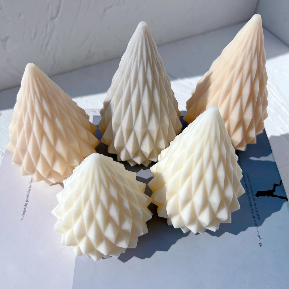Overhead view of five pointed diamond-textured cone candles