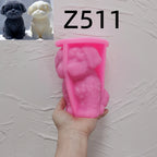 Pink silicone seated puppy mold labeled Z511 held open