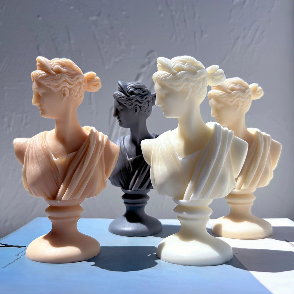 Classical draped bust candle castings viewed from different sides