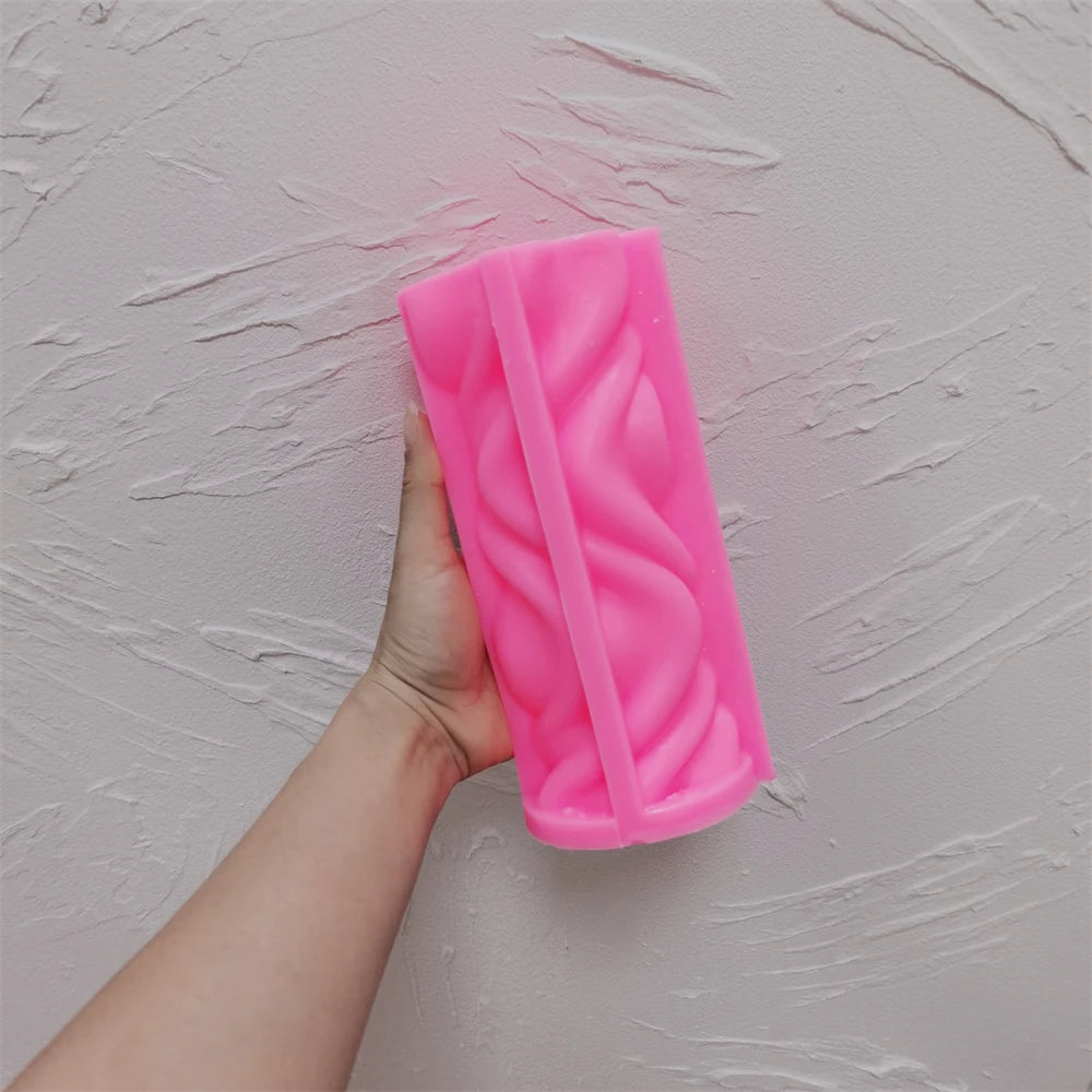 Pink silicone smooth wave twist mold held open