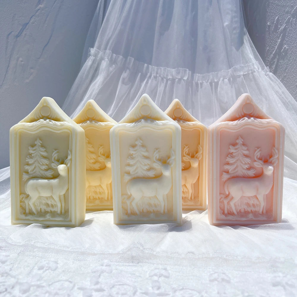 Pastel reindeer plaques with raised pointed-roof borders