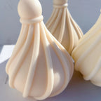 Close-up of curving ribs rising toward the round ball top