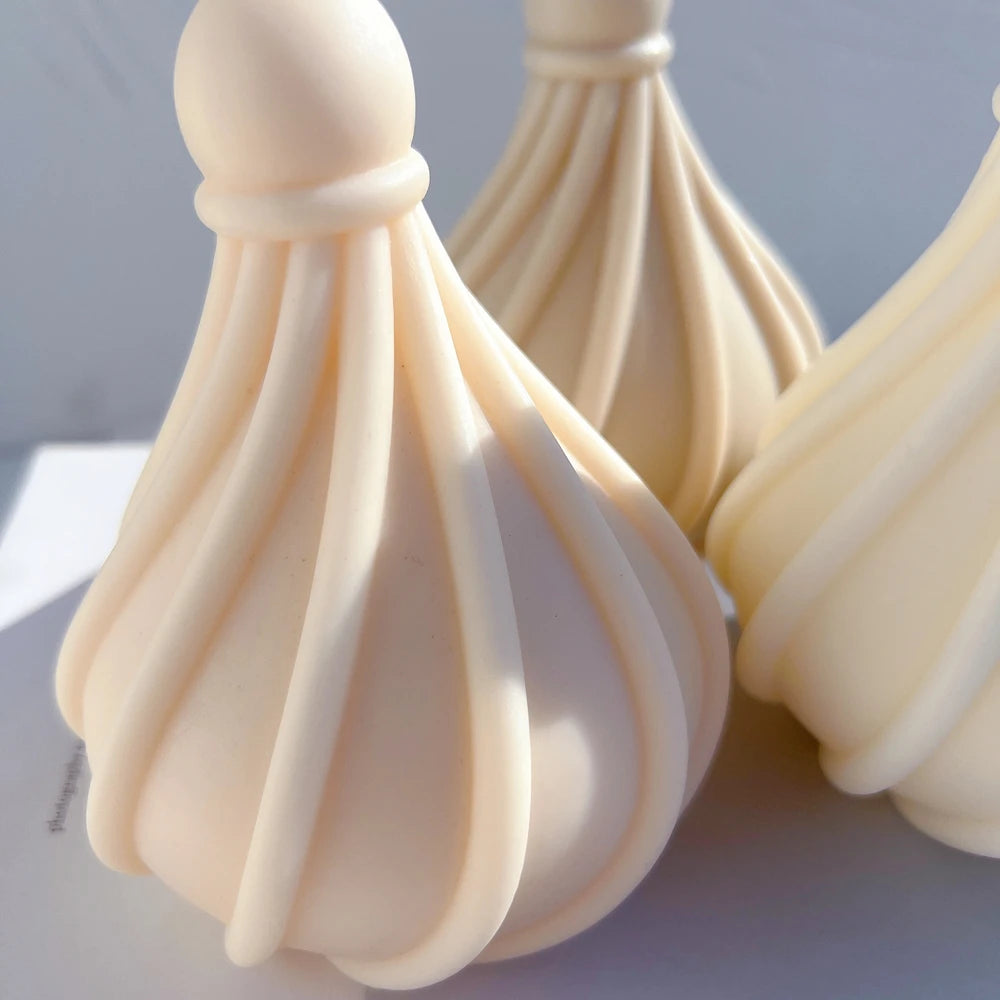 Close-up of curving ribs rising toward the round ball top