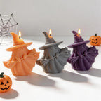 Orange gray and purple ghost witch candles with wide-brimmed hats