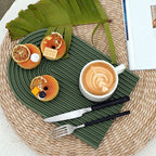 Green circular ribbed tray with cups and food display props