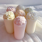 Ribbed pillars topped with two different flower designs