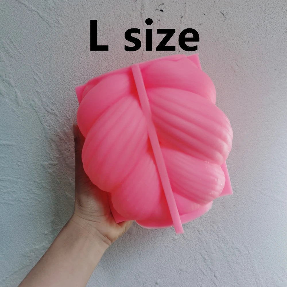 Pink silicone Large braided-swirl mold with size label