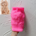 Pink silicone mold cavity for a seated fluffy Chow Chow dog sculpture