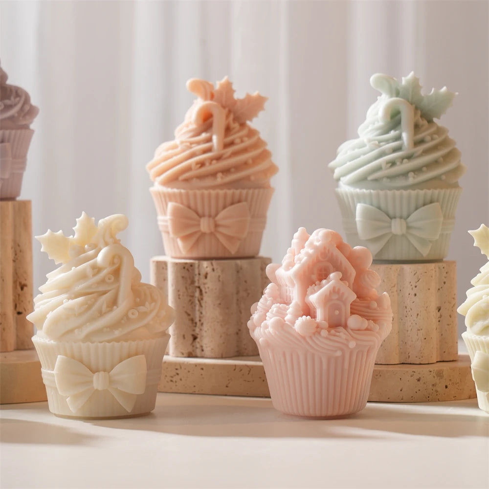 Christmas cupcake castings showing bow and snowy-house designs
