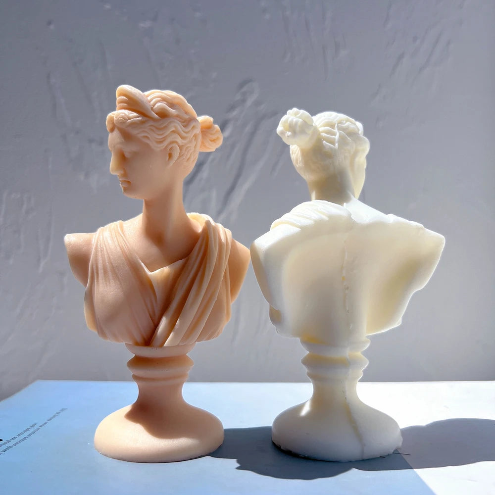 Front and rear views of swept-back-hair bust castings with diagonal shoulder drapery
