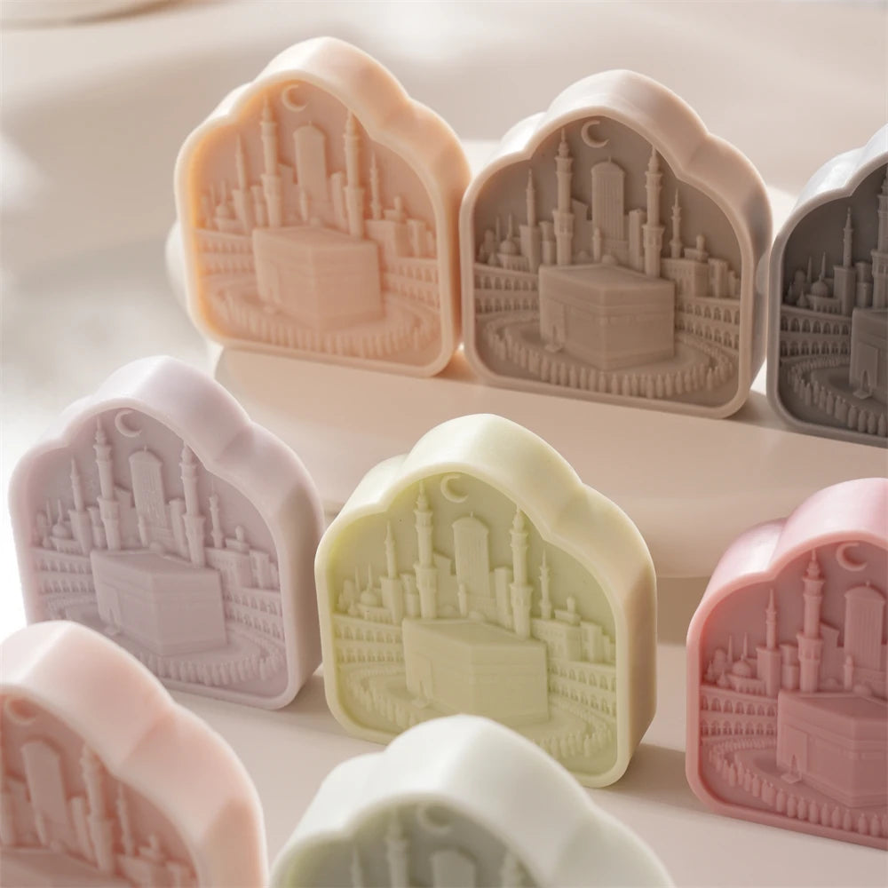 Angled display of Kaaba plaques on a round stand
