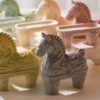 Ornate horse-shaped hollow decorative holders in several casting colors