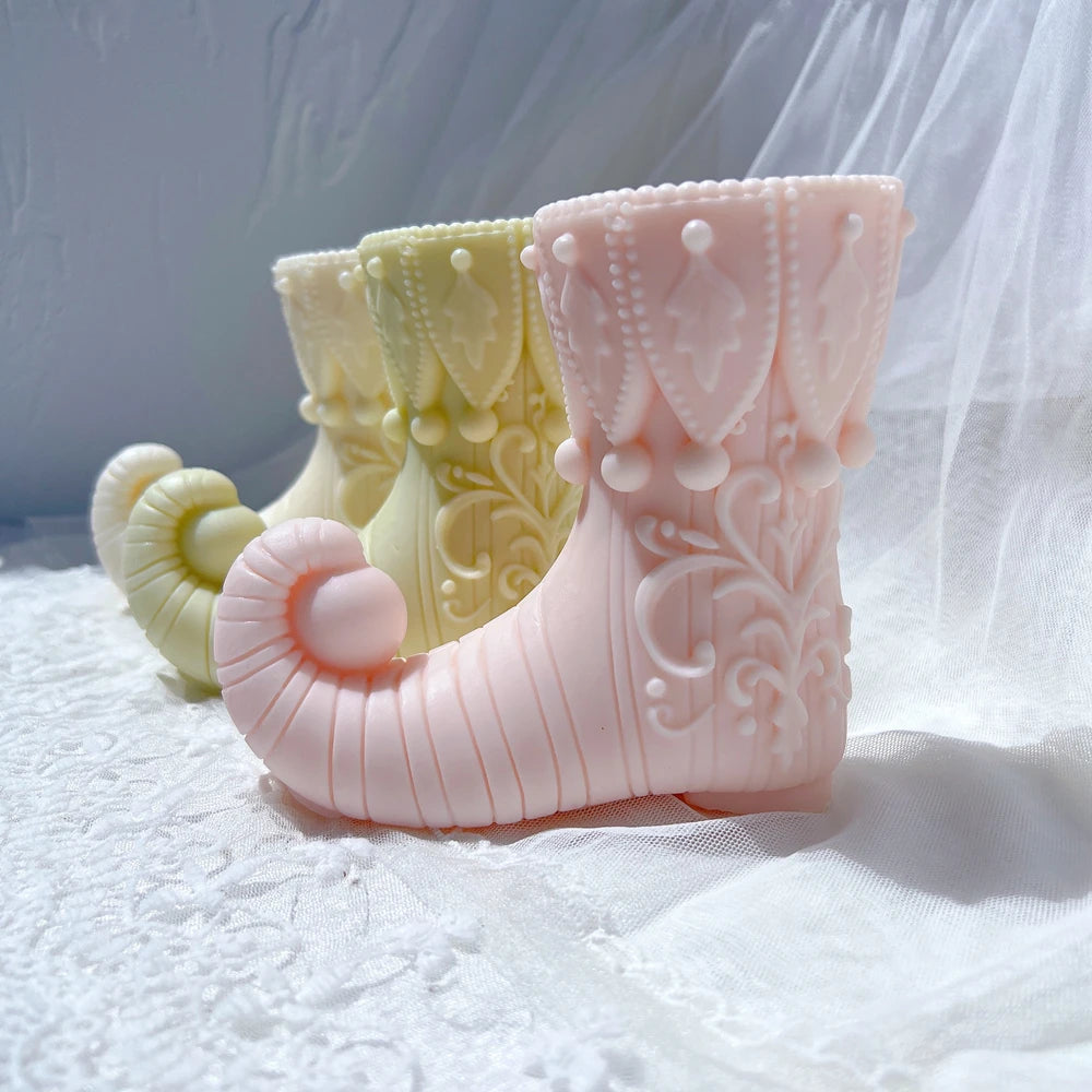 Ornate elf boots showing raised scrollwork
