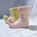 Ornate elf boots showing raised scrollwork