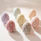 Overhead view of floral bunny-face egg castings
