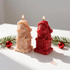 Two hedgehog chimney candles with winter hats