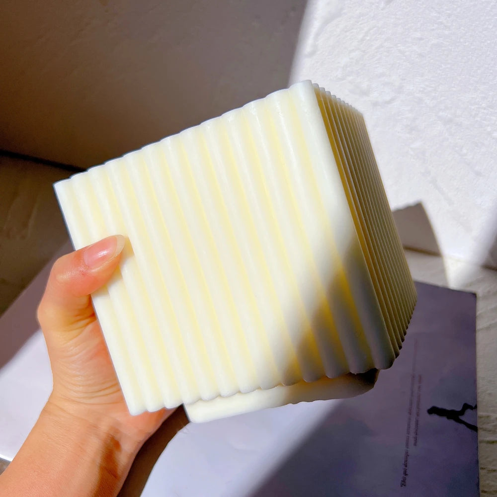 Ribbed block casting held in a hand