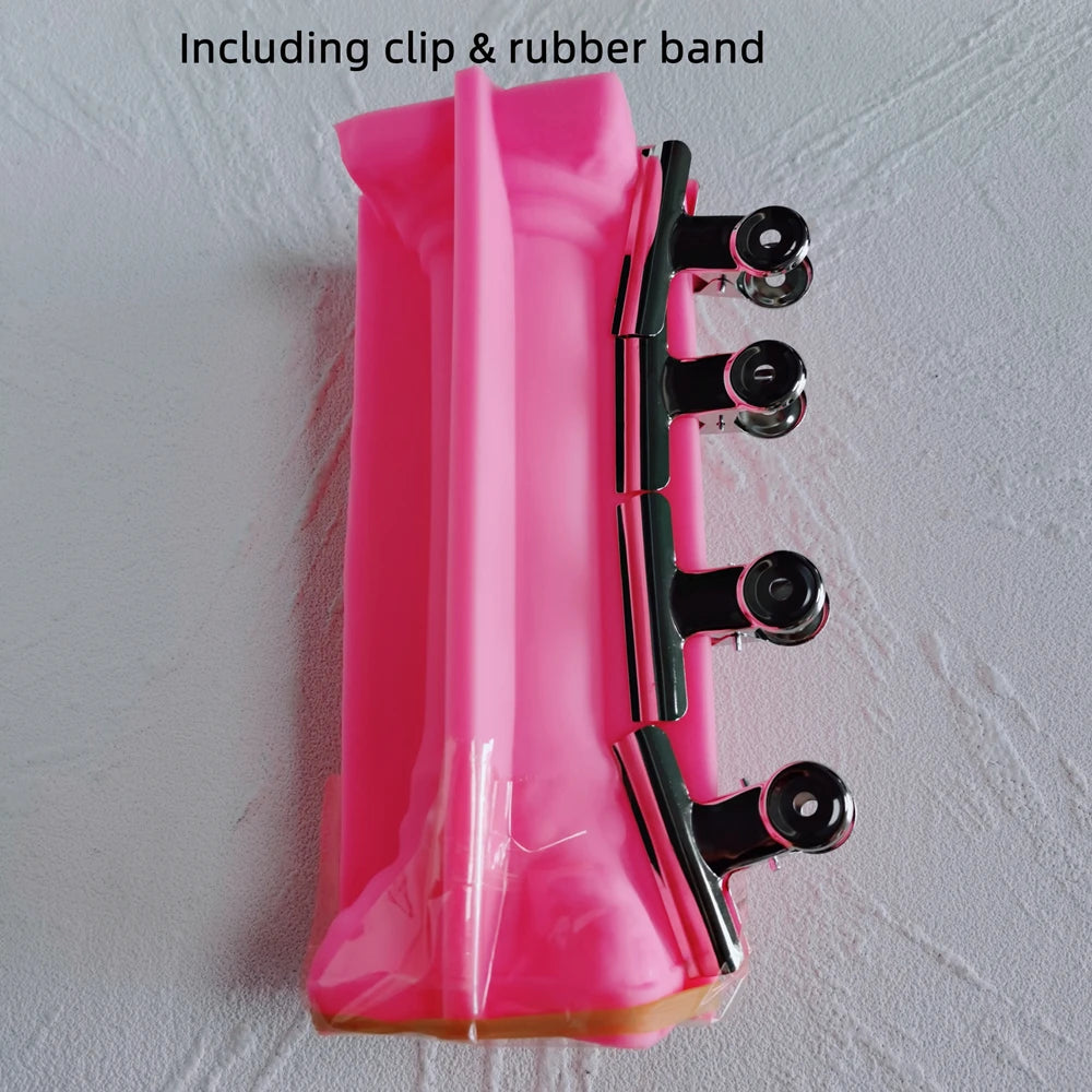 Pink column silicone mold secured with the included clip and rubber band