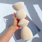 Angled hand-held view of the flared top and continuous ribs