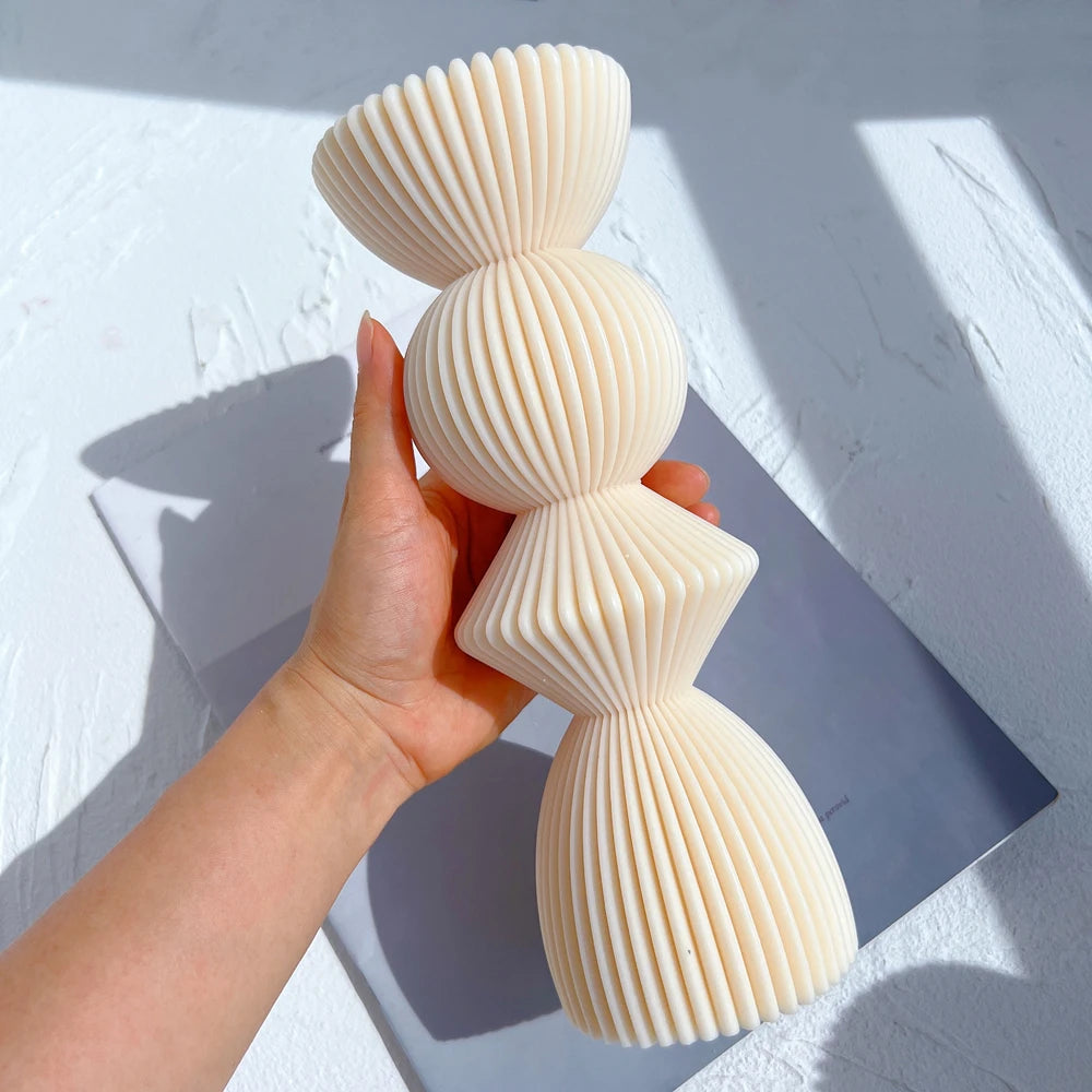 Angled hand-held view of the flared top and continuous ribs