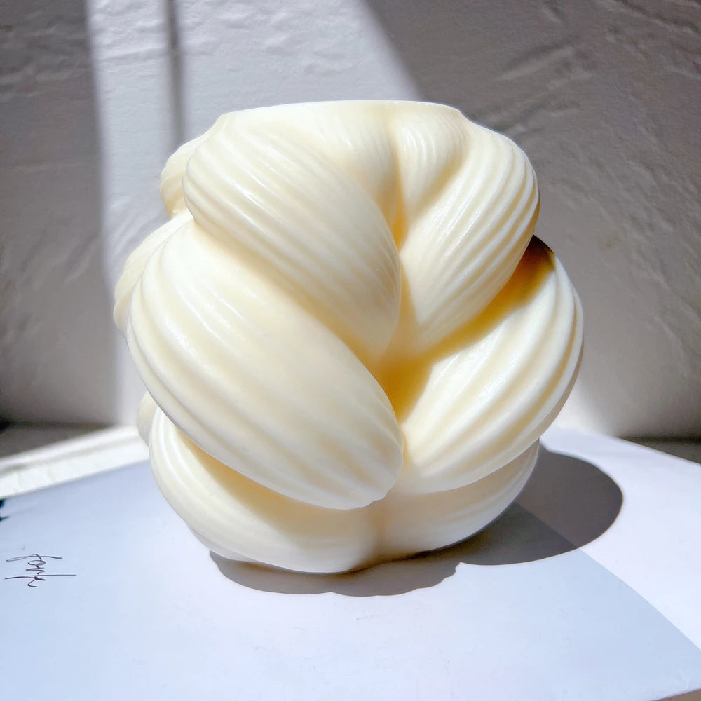 Angled view of Large braided-swirl casting