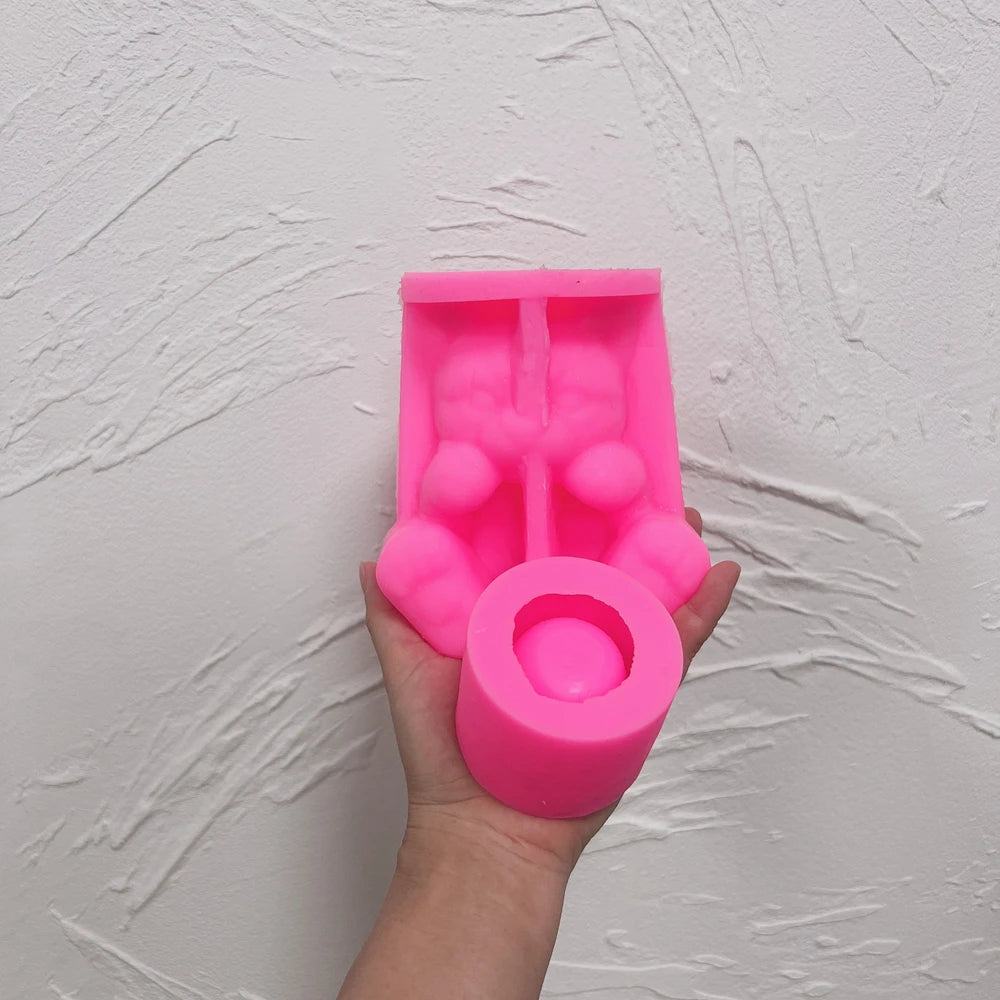 Pink cat holder silicone mold showing the open belly and cup-forming area