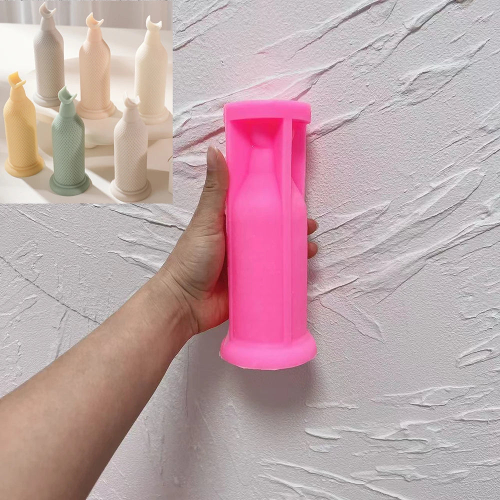 Pink silicone mold for slender crescent-topped pillar candle design