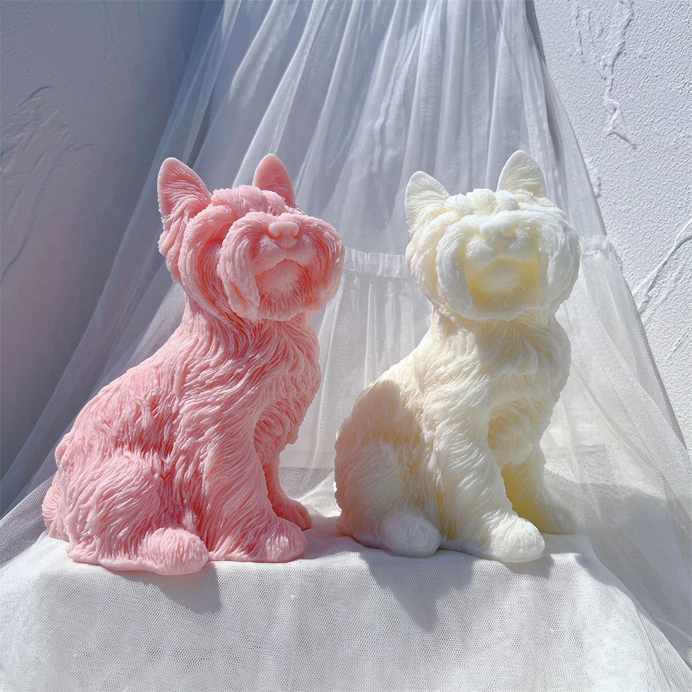 Pink and cream terrier candle figures viewed from the front