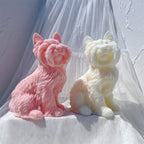 Pink and cream terrier candle figures viewed from the front