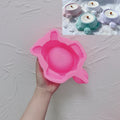 Pink silicone sea turtle vessel mold with round core