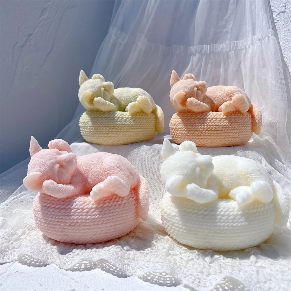 Sleeping cat castings viewed from the front