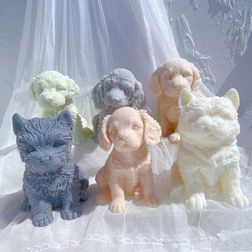 Dog figurine candles with different coats and sitting poses