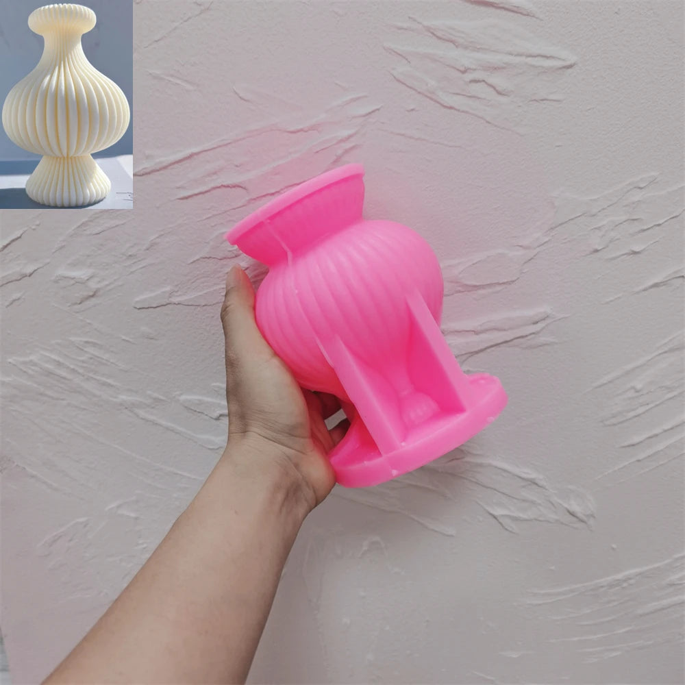 Pink silicone mold for short rounded vase-shaped candle