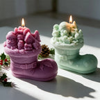 Cottage-scene boot candles in purple and green with buckle and holly details