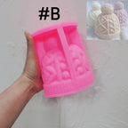 Pink silicone Geometric B hat mold with angular and branching relief